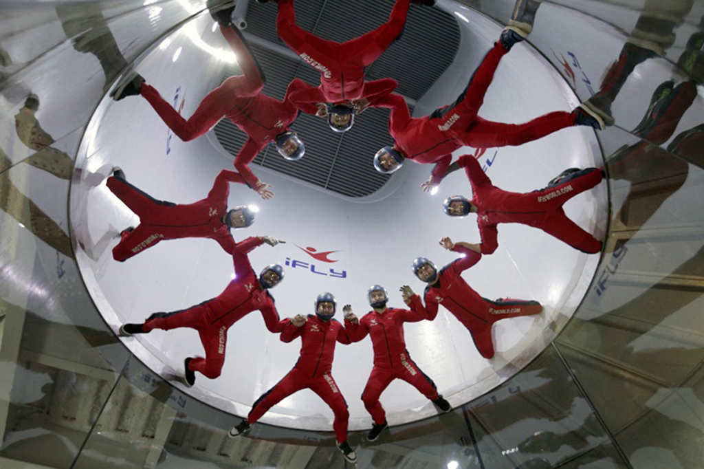 We know what pilots say when SkyDiving is mentioned – ‘I’ll never jump out of a perfectly good airplane’. Well now you don’t have to. IFly is an indoor skydiving experience that creates true free fall conditions, just like skydiving, without having to jump out of an airplane. IFly is opening its newest location in North Houston’s Oak Ridge North, coming January of 2015. You can give the give of flight this Christmas by purchasing a gift card. 